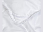 SNAP-EZ Quilt lightweight duvet insert with snap-on loops for secure bedding attachment