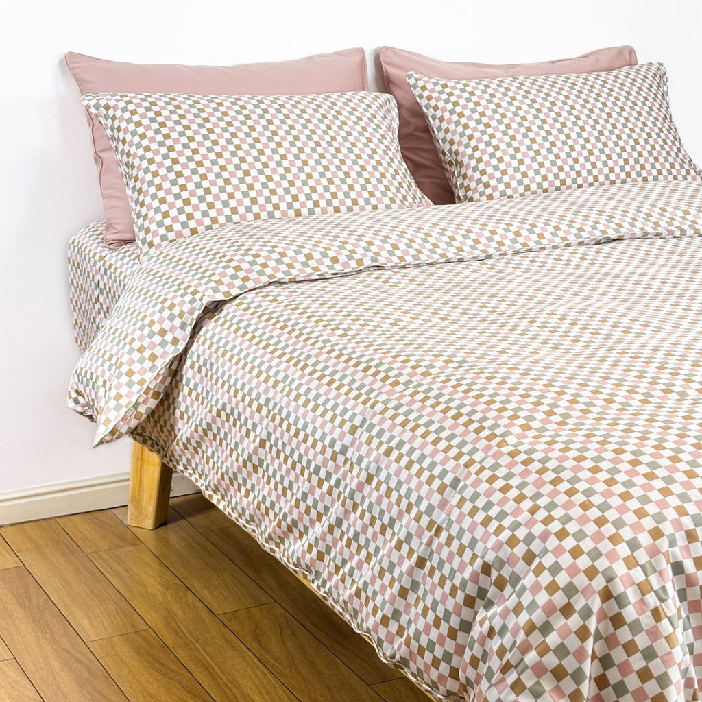 Colorful sage checker bedding set with snaps on bed