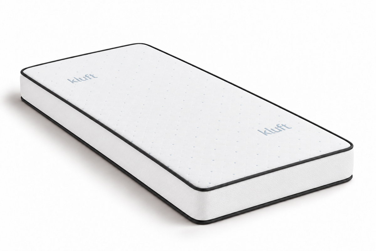 Forma Firm mattress with blue dots and Kluft lettering